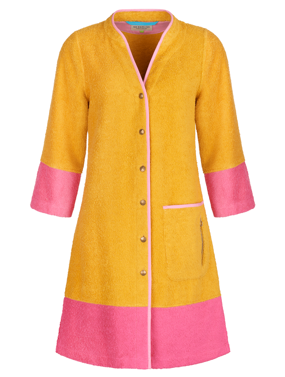 So English Ramona dress in mustard and pink, short robe style, featuring a stylish, colorful design and lightweight fabric.