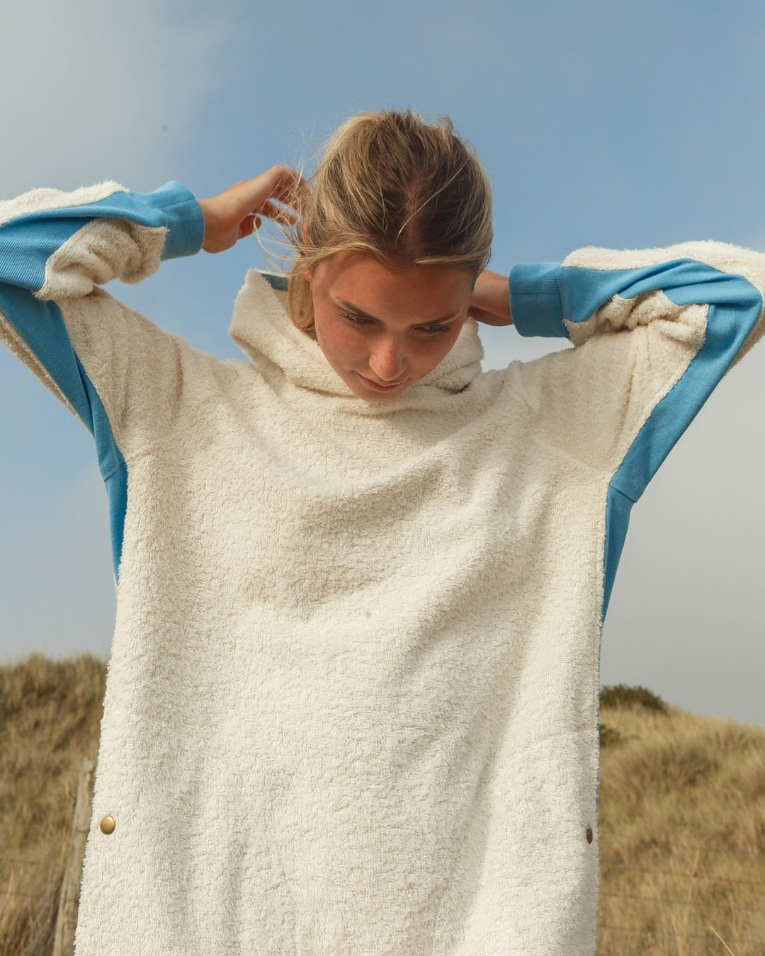 Ecru and sky blue long hoodie by So English, featuring a relaxed fit and casual beachwear style, made in the UK.