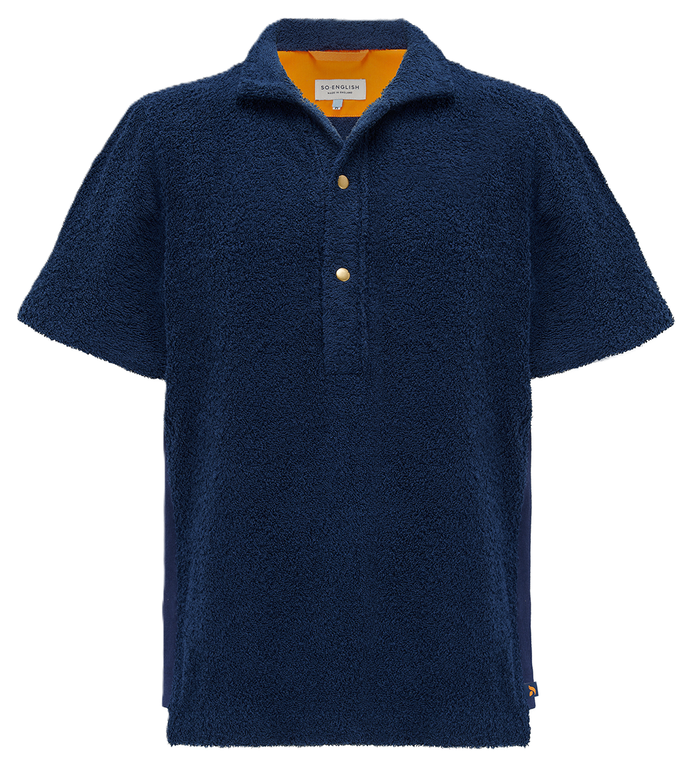 Navy Bond polo shirt from So English, made in the UK, displayed laid flat showing collar, buttons, and short sleeves.