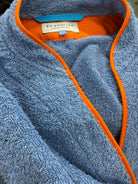 Ramona blue long towelling robe with orange detail neckline close up