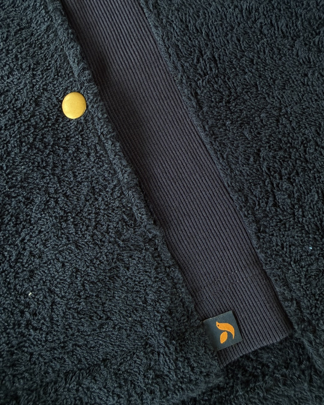 Navy Hampstead hoodie by So English featuring a comfortable fit, soft fabric, and subtle branding, shown on a model.