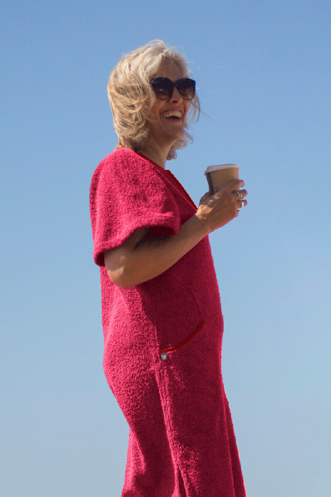 So English Kiss Precious Pink short dress, lightweight beachwear with a vibrant pink color and casual fit, perfect for summer outings.