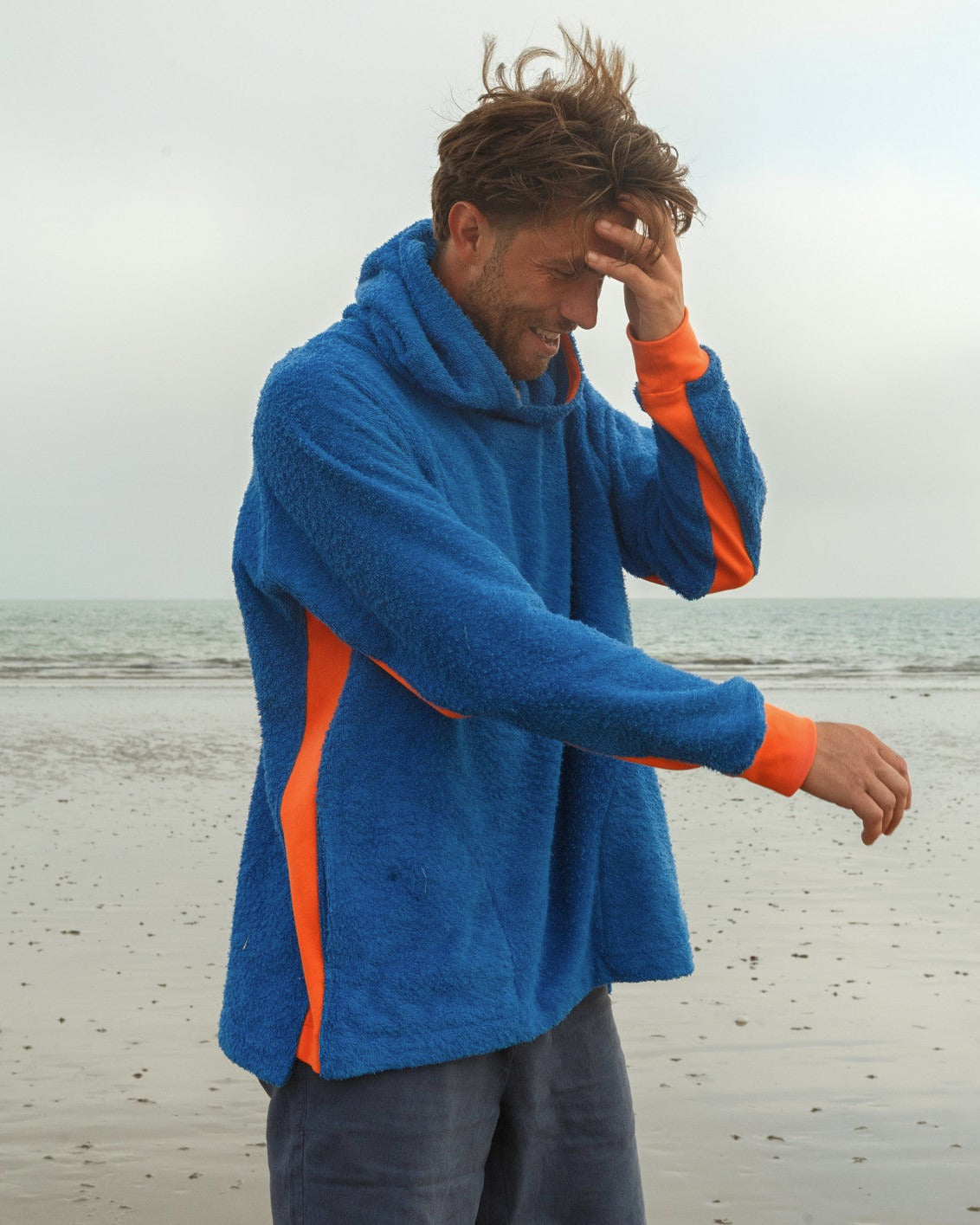 Bright blue and orange Hampstead hoodie by So English, featuring a casual, comfortable design with beachwear style.