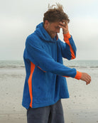 Bright blue and orange Hampstead hoodie by So English, featuring a casual, comfortable design with beachwear style.