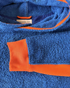 So English Bude long hoodie in Brighton Blue and Orange, featuring a cozy neckline and casual beachwear style.