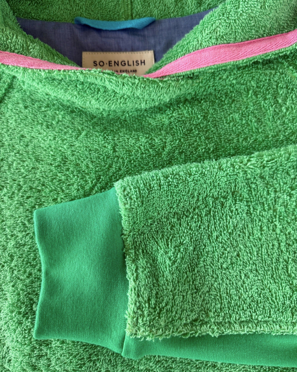 Fresh green Bude long hoodie by So English with neckline detail, casual beachwear style, made in the UK.