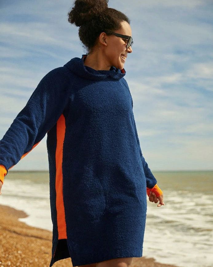 Navy and orange long hoodie by So English, styled for casual beachwear, featuring a relaxed fit with a hood and soft fabric.
