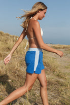Bright blue and sky blue Carly shorts by So English, casual beachwear styled for comfort and summer outings.