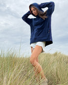 Navy So English Hampstead hoodie with a relaxed fit, featuring a drawstring hood and soft fabric, made in the UK.