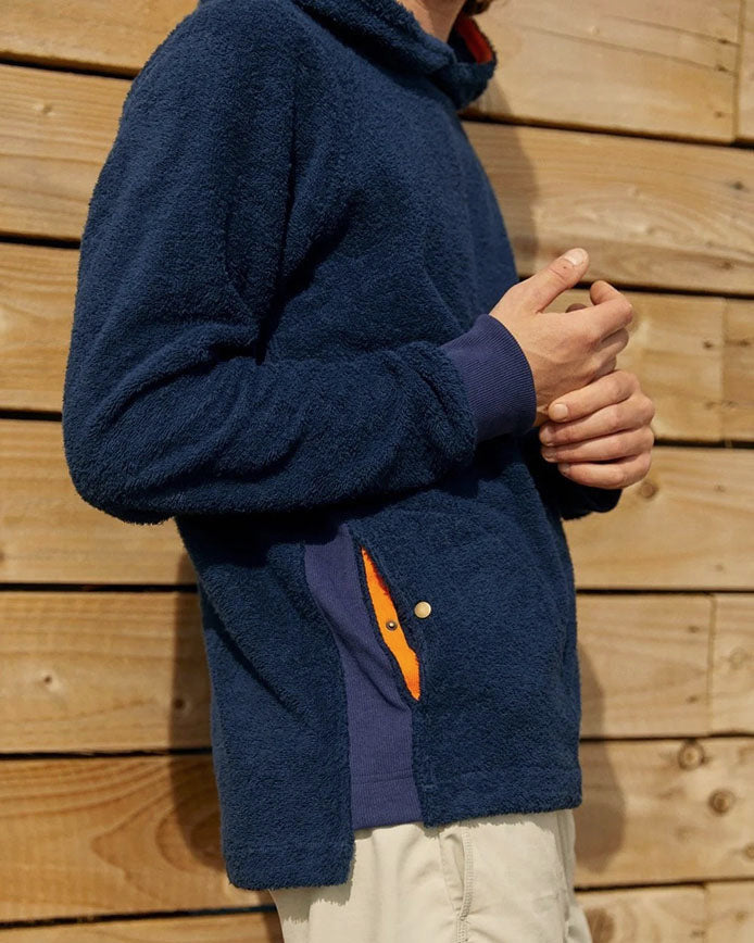 Navy So English Hampstead hoodie with front pocket and logo detail, casual style, made in the UK, displayed on a model.
