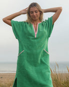 So English Kiss Fresh Green short dress with a playful kitty crop design, perfect for casual beachwear or summer outings.
