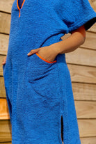 So English Kiss Brighton Blue short dress featuring a stylish beachwear design with intricate detailing and vibrant blue color.