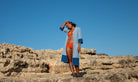 Blue Ramona short robe dress by So English, casual beachwear with a relaxed fit, displayed on a model in a scenic outdoor setting.