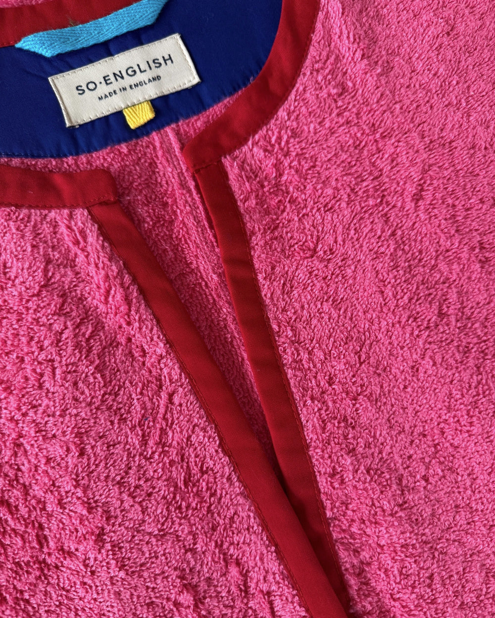 Pink Kiss dress by So English featuring a short style with a detailed neckline, perfect for casual beachwear.