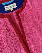 Pink Kiss dress by So English featuring a short style with a detailed neckline, perfect for casual beachwear.