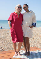 So English Kiss Precious Pink short dress with a beachwear style, vibrant pink fabric, and casual fit.