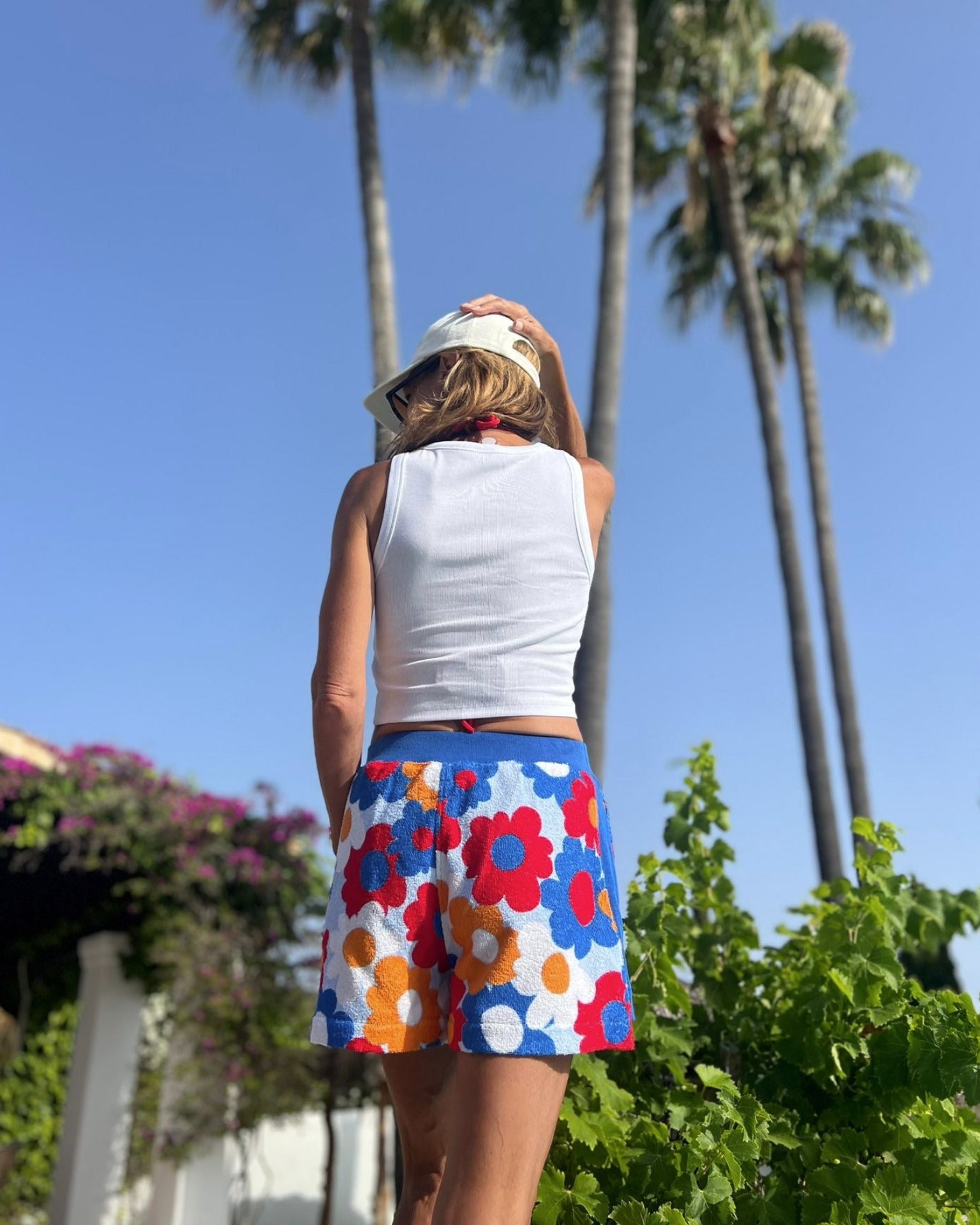 So English Carly print shorts with vibrant beachwear design, featuring lightweight fabric and casual fit for summer wear.